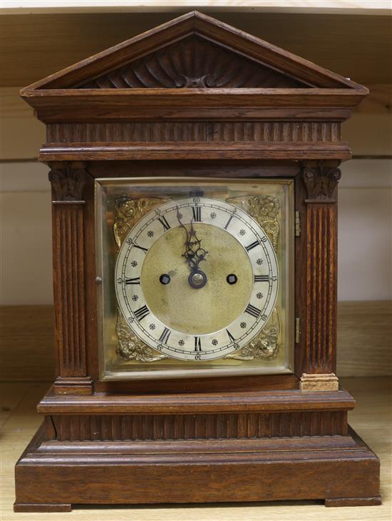 An Edwardian oak twin fusee bracket clock